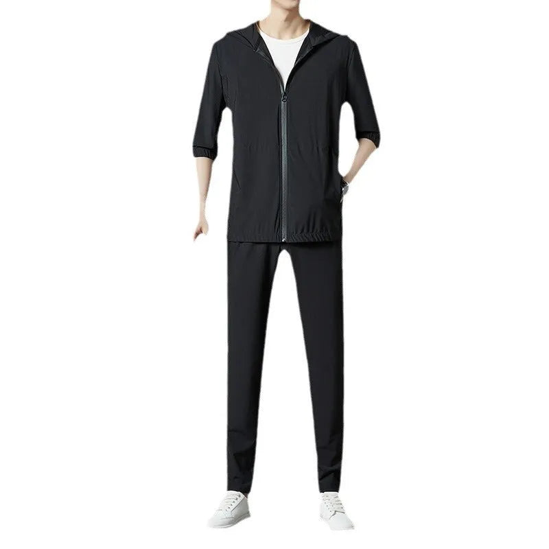 Korean style loose hooded sun-protective suit in grey, blue, or black, featuring top stitching pockets.