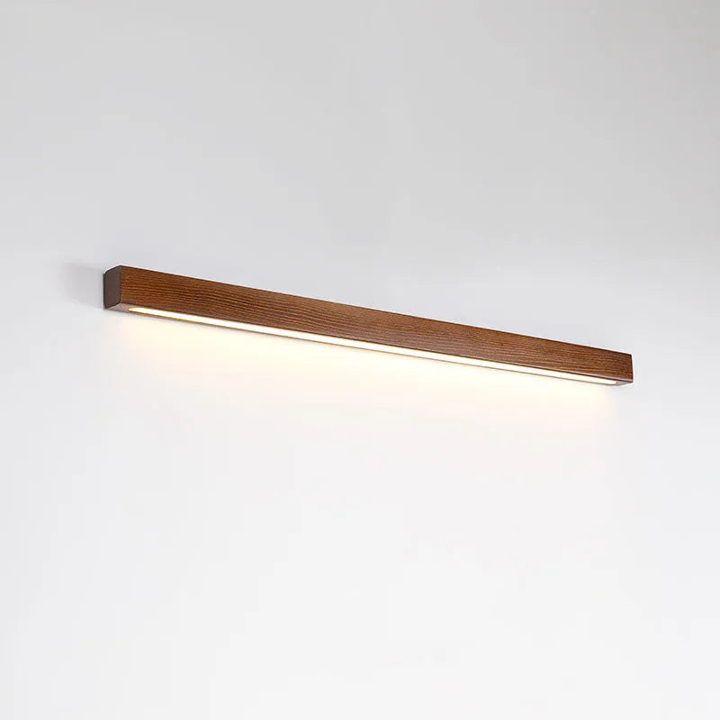 Walnut coloured Log Strip Wall Lamp linear LED light fixture in wood and acrylic