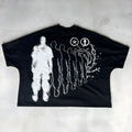 Black sleeveless loose top with lace-up front and a white 3D digital pattern detail.