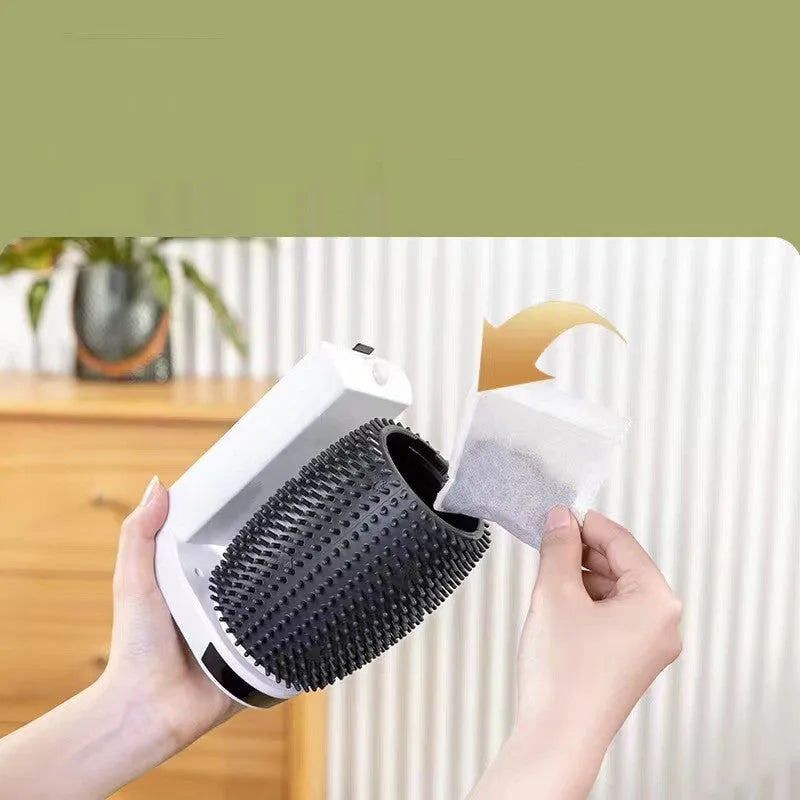 White automatic cat self groomer with silicone bristles mounted in wall corner
