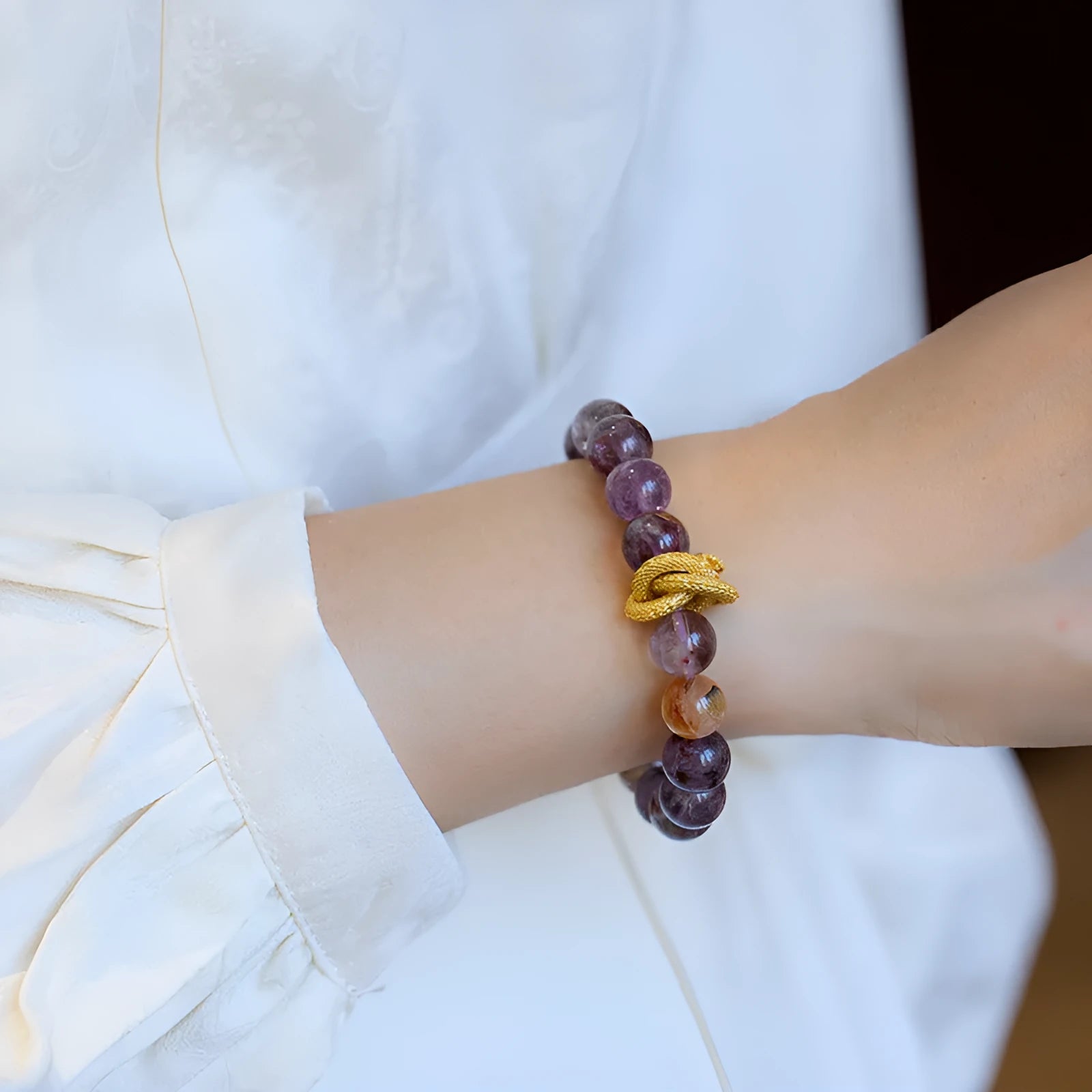 Purple crystal bracelet with animal zodiac beads and nine purple good luck elements