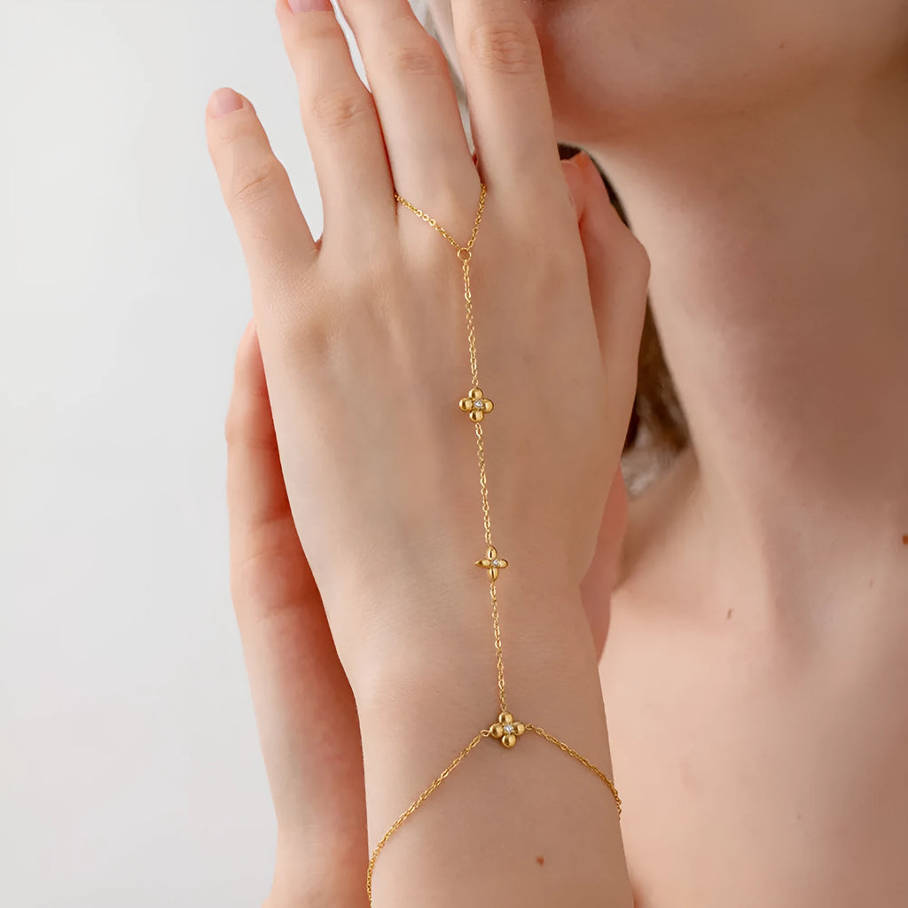 Gold-colour stainless steel women's bracelet with geometric flower and eight-pointed star design