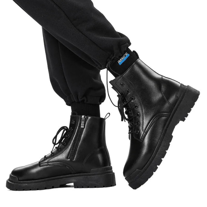Men's black mid-top PU boots with a flat rubber sole, shown on a white background.