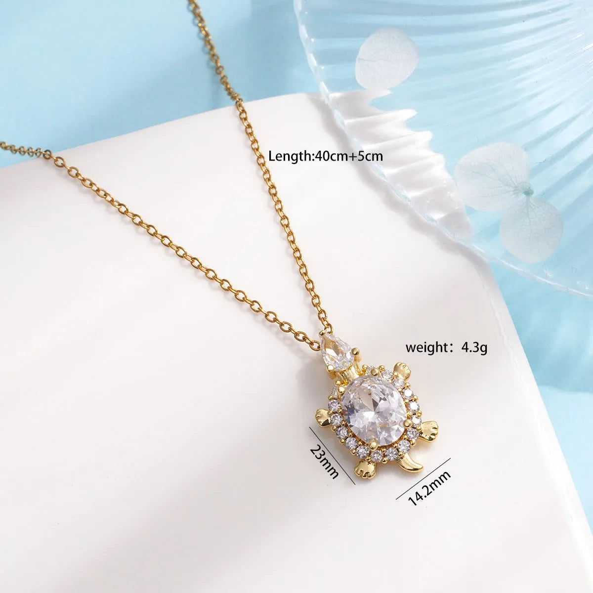 Gold-plated copper sea turtle pendant necklace with mixed gemstone inlay and zirconium encrustation on titanium steel chain