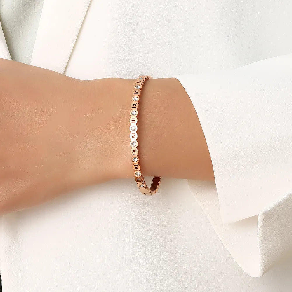 Korean-style titanium steel bracelet with electroplated finish in gold, rose gold or steel colour featuring number design elements