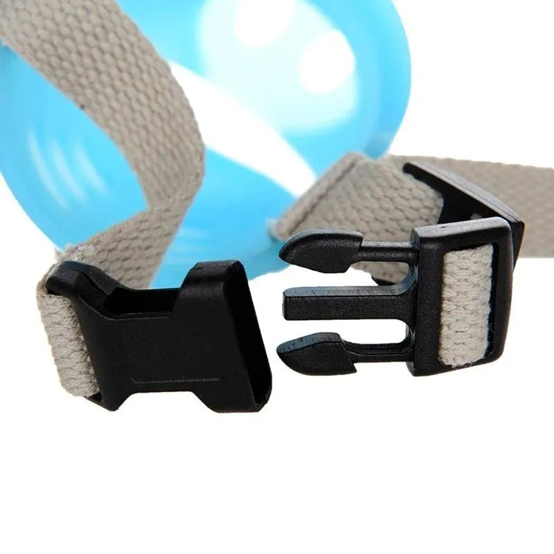 Blue and green silicone dog muzzle covers shown in small and large sizes for anti-bite training.