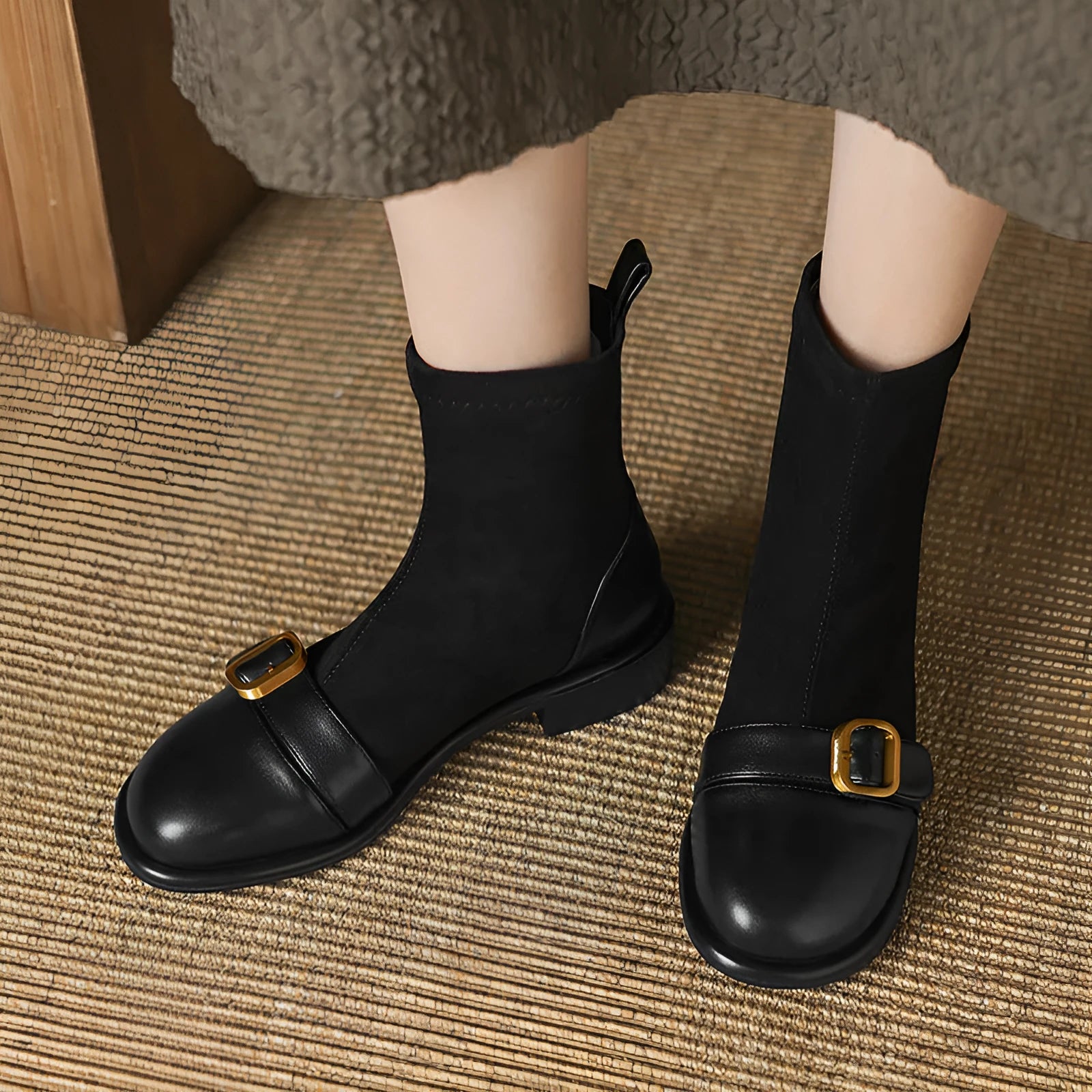 Women's black low heel ankle boots with lace-up front and decorative belt buckle stitching