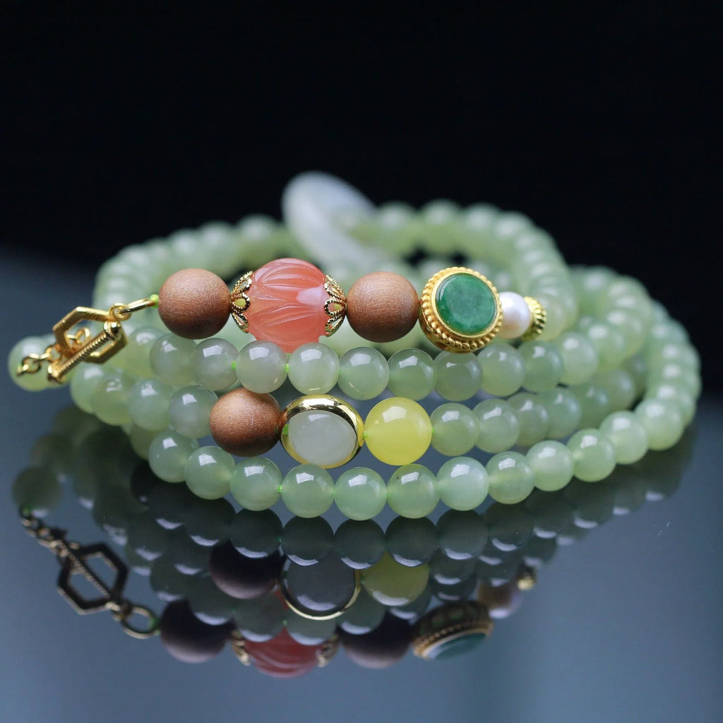 Hetian jade red lotus beads necklace with white sandalwood beeswax bracelet featuring zodiac animal modelling