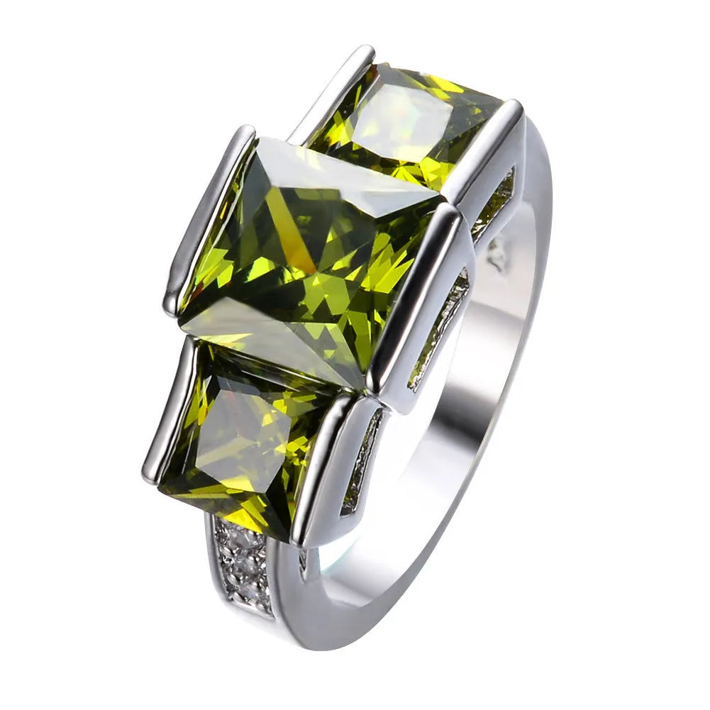 A colourful electroplated copper women's ring with a geometric design, shown in multiple colour options.