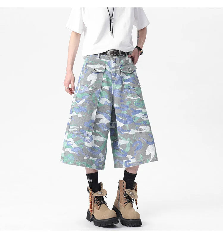 Denim camouflage cropped trousers with straight leg and utility pockets on mannequin