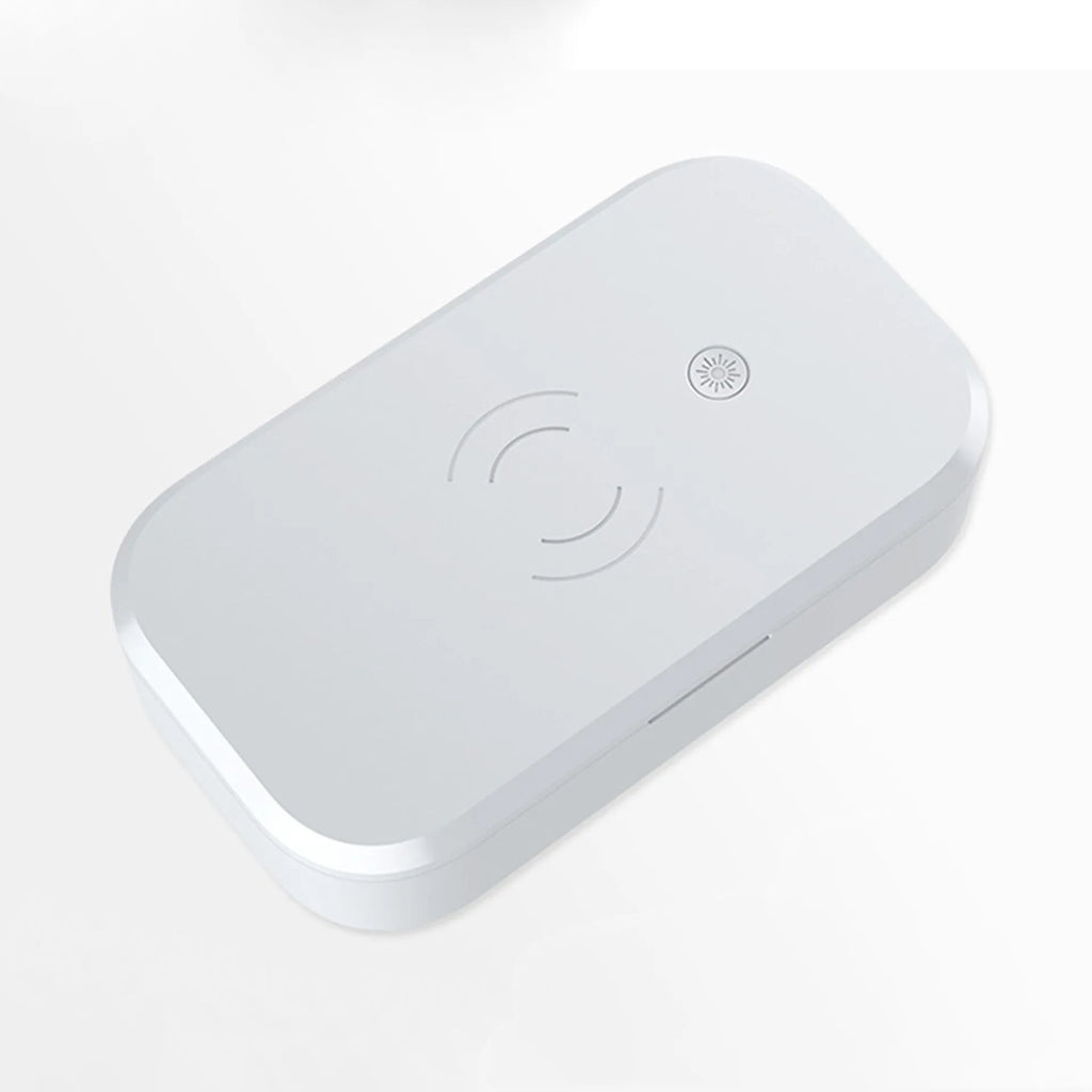 White ultraviolet disinfection box with wireless phone charging pad on top