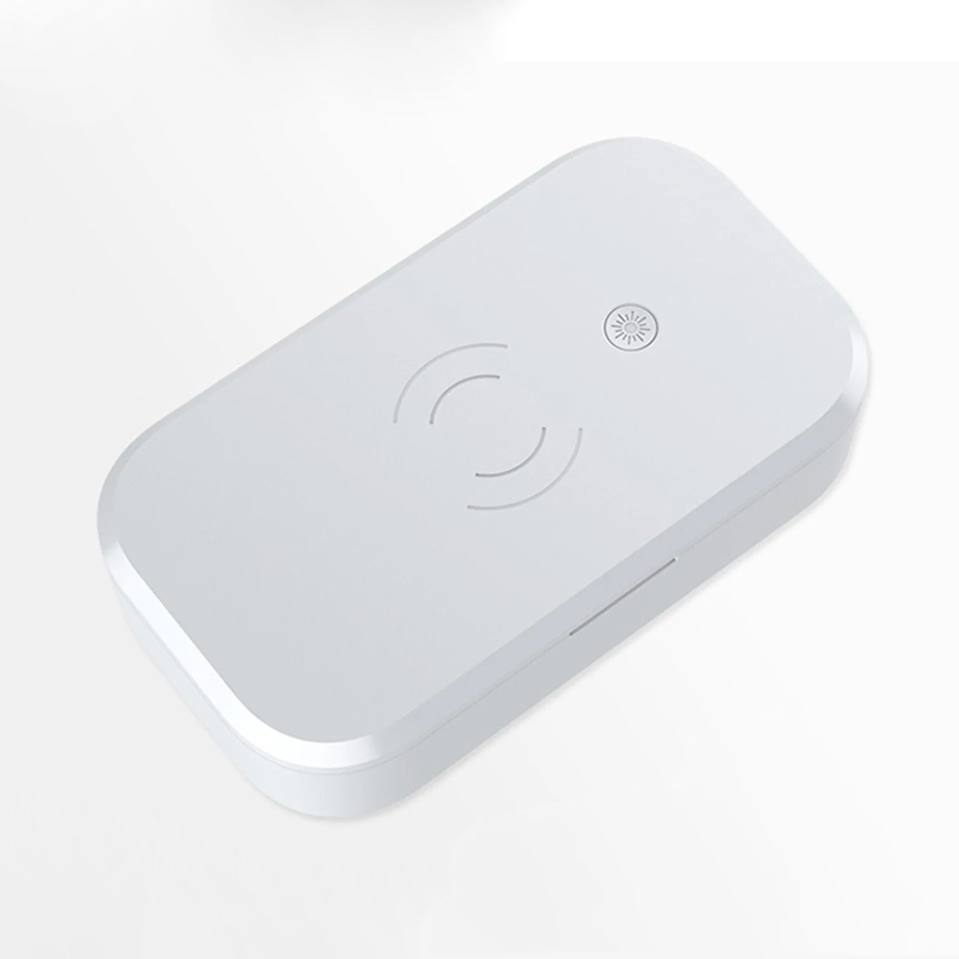 White ultraviolet disinfection box with wireless phone charging pad on top
