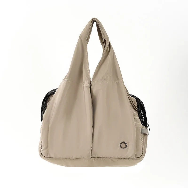 Apricot cloth pet carrier handbag showing dimensions and breathable construction