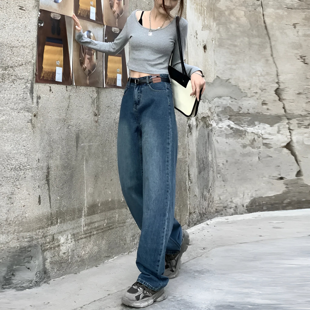 Women's high waist straight leg jeans in retro blue denim, shown on a model.