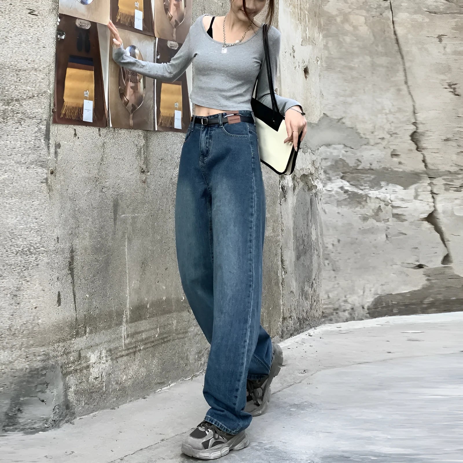 Women's high waist straight leg jeans in retro blue denim, shown on a model.