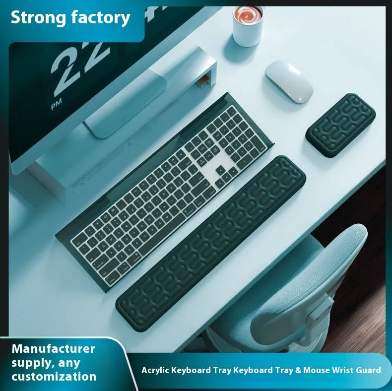 Double-sided keyboard and mouse pad with memory foam wrist rest on a resin base.