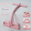 Purple home fitness pedal tension device with puller and rope for waist and arm workouts.