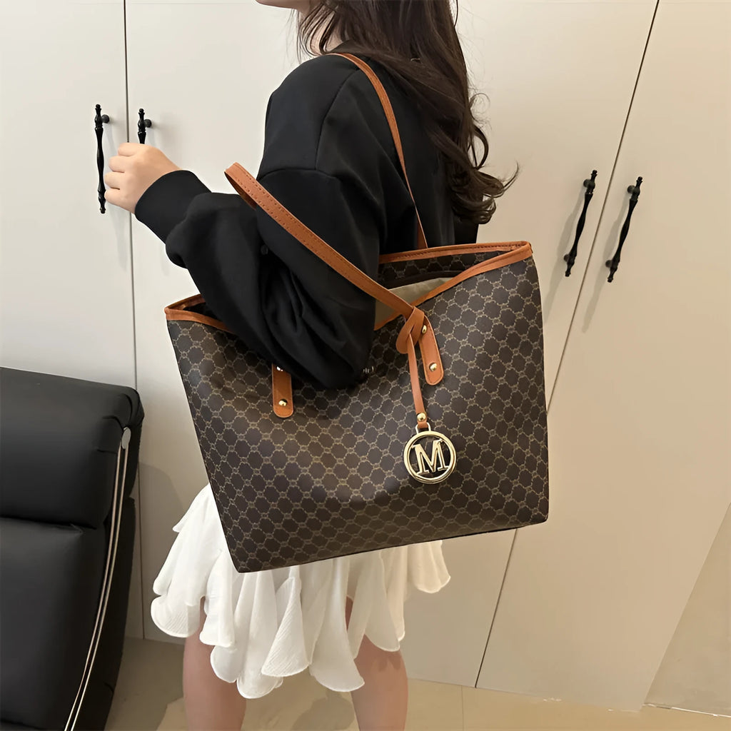 Western style black PU leather shoulder bag with adjustable strap and sewing thread detail.