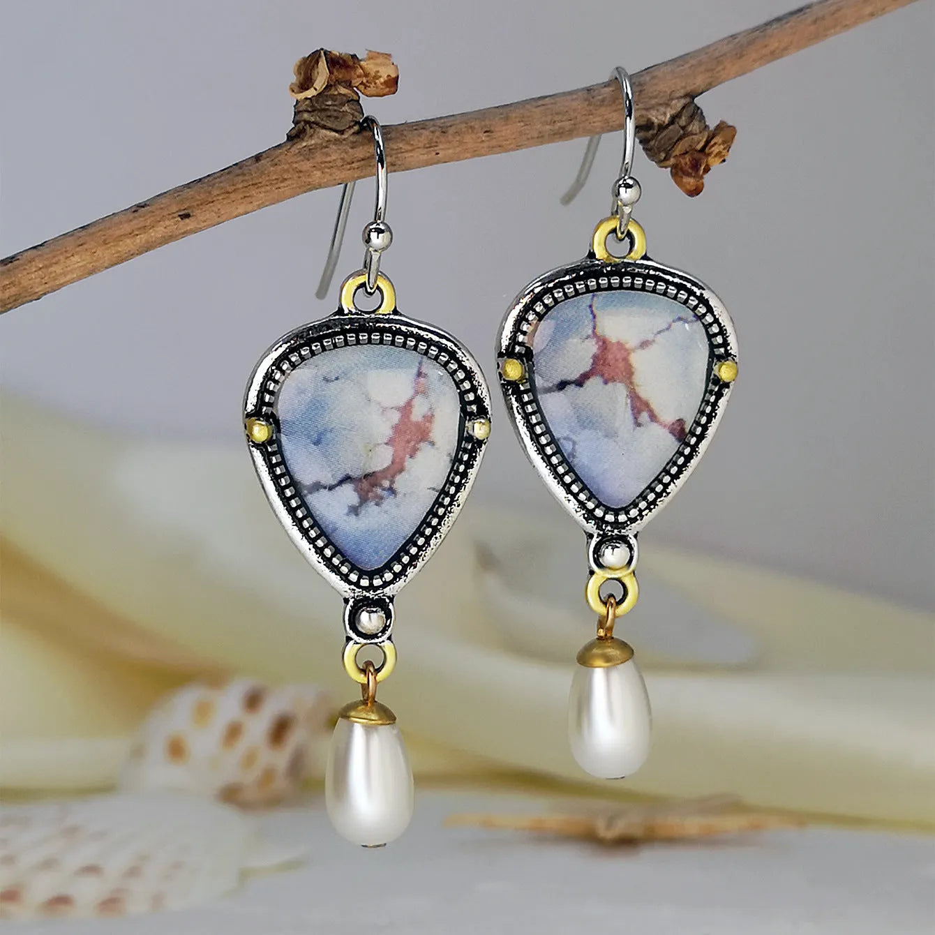 Retro blue geometric drop earrings with synthetic opal and pearl details on electroplated metal