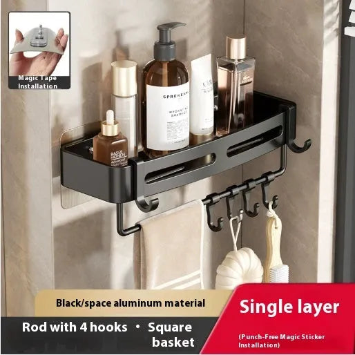 Gun grey metal triangle corner shelf mounted on a bathroom wall for shower storage.