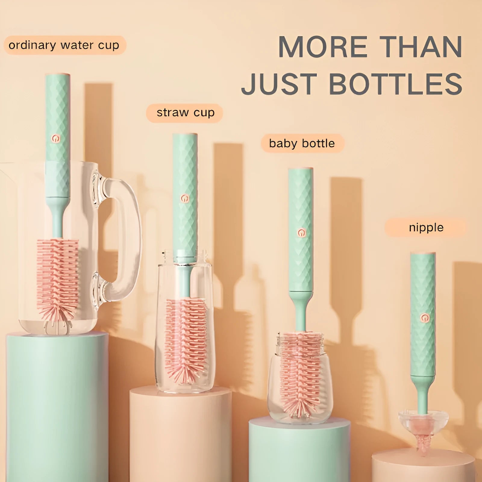 Pink electric bottle brush with rotating silicone head for cleaning baby bottles and pacifiers