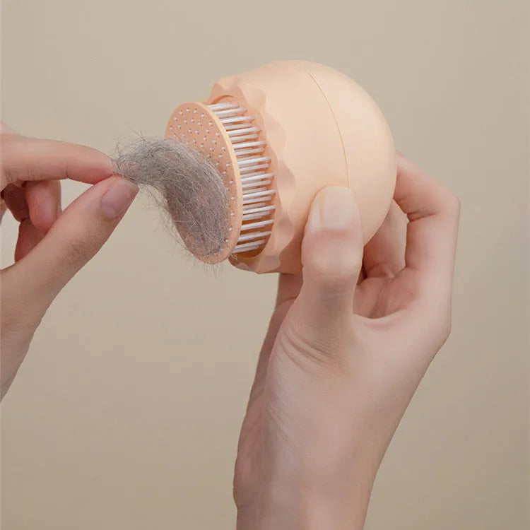 Floating massage pet needle comb in orange pink and baby blue, soft silicone brush for cat hair cleaning
