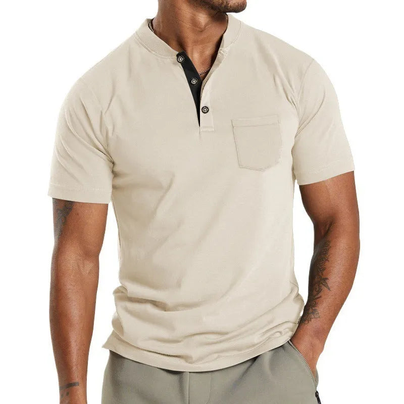 Plus size man wearing a solid colour short sleeve shirt with a buttoned chest pocket.