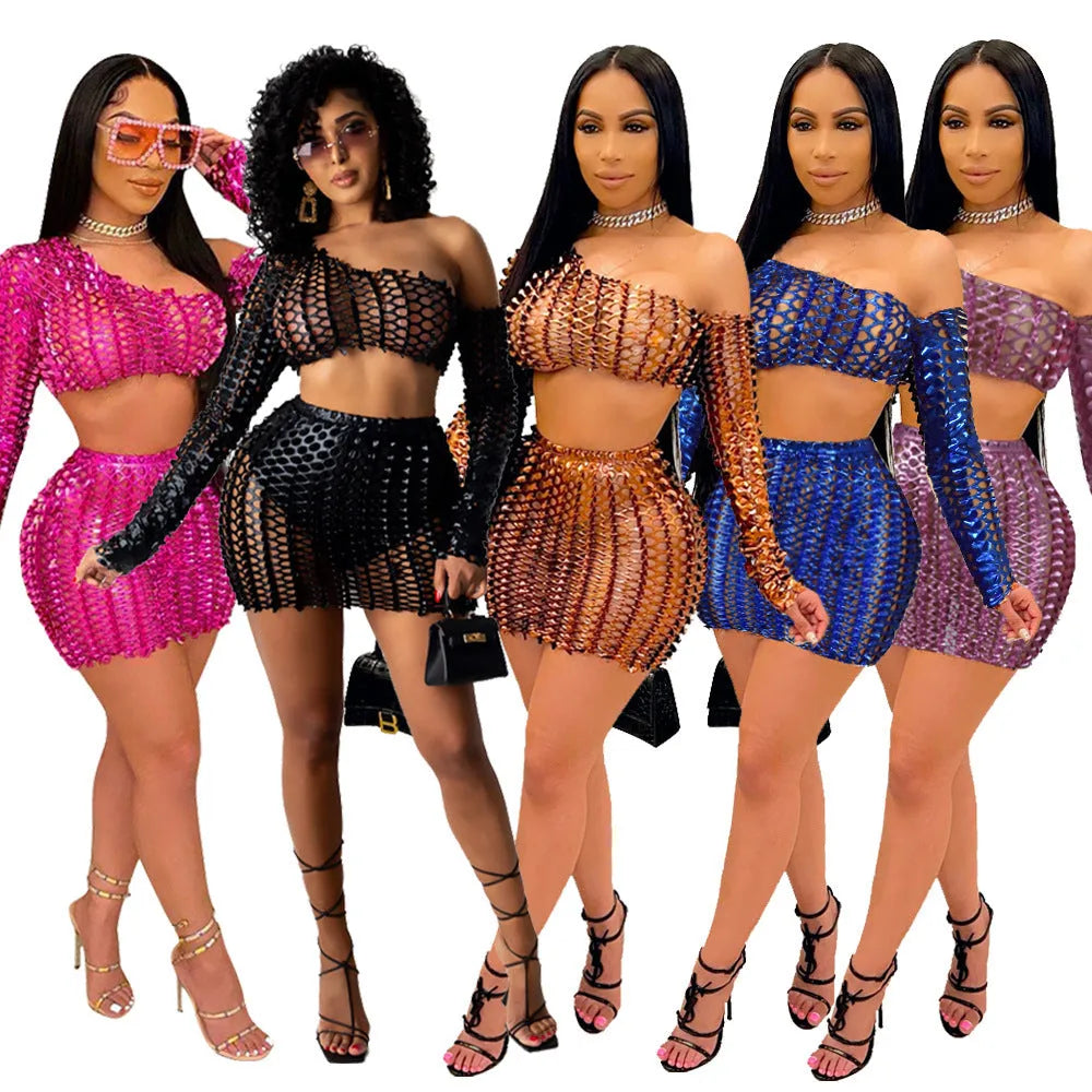 Women's black hollow-out two-piece dress set with net hole pattern showing sleeveless top and short skirt