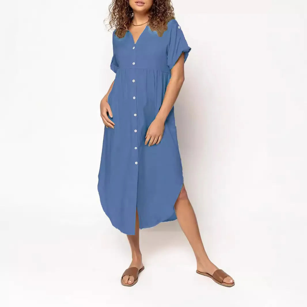 A solid colour mid-length casual dress with a button-down front and regular sleeves on a hanger.