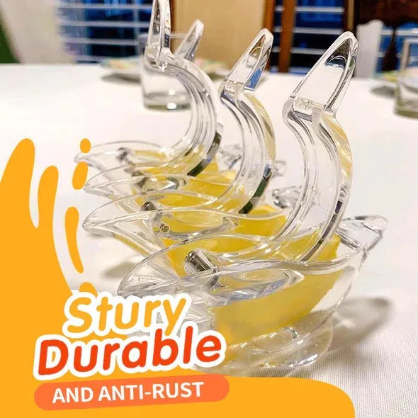 Transparent acrylic manual lemon juicer with bird-shaped design on a kitchen counter