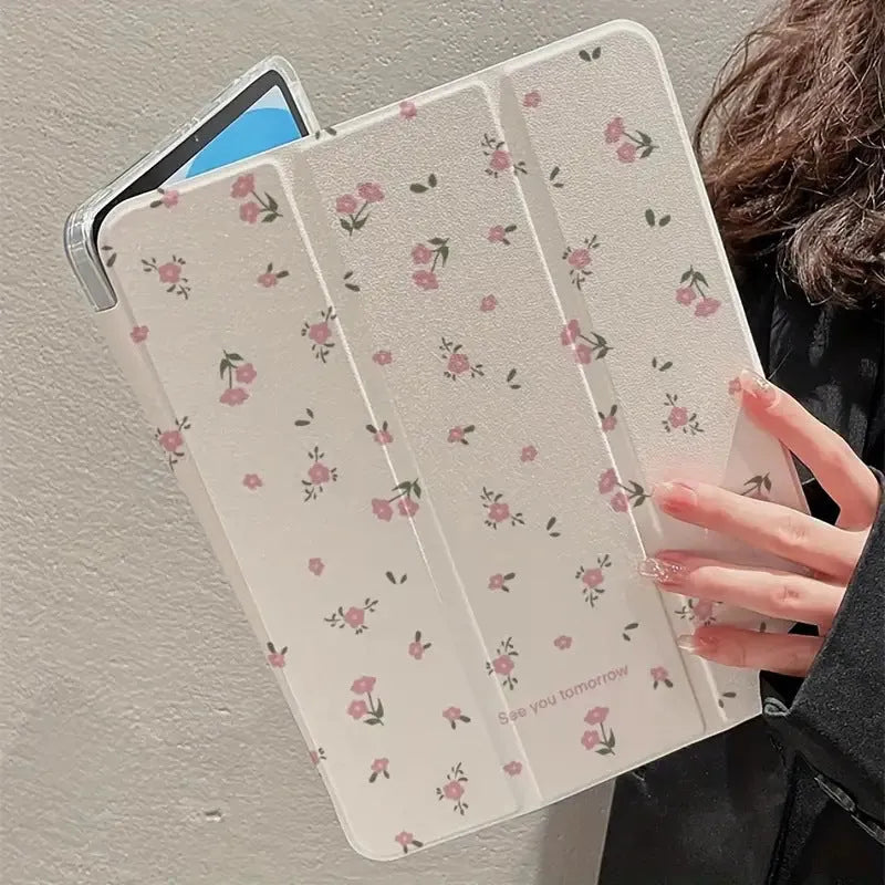 Transparent floral patterned tri-fold iPad case showing magnetic stand function