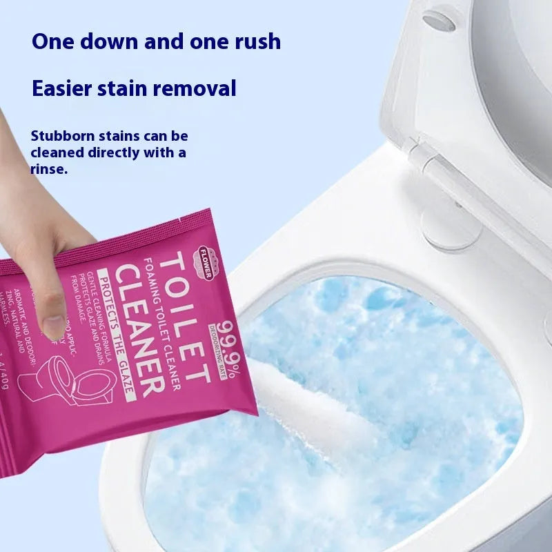 Box and sachets of effervescent toilet bubble powder cleaner in blue and pink variants.