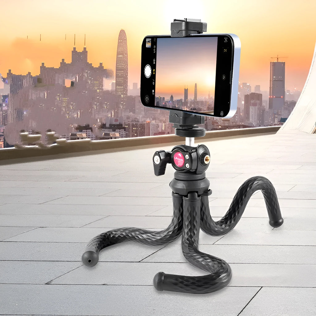 Black aluminium mobile phone tripod set with adjustable legs and phone clip attached