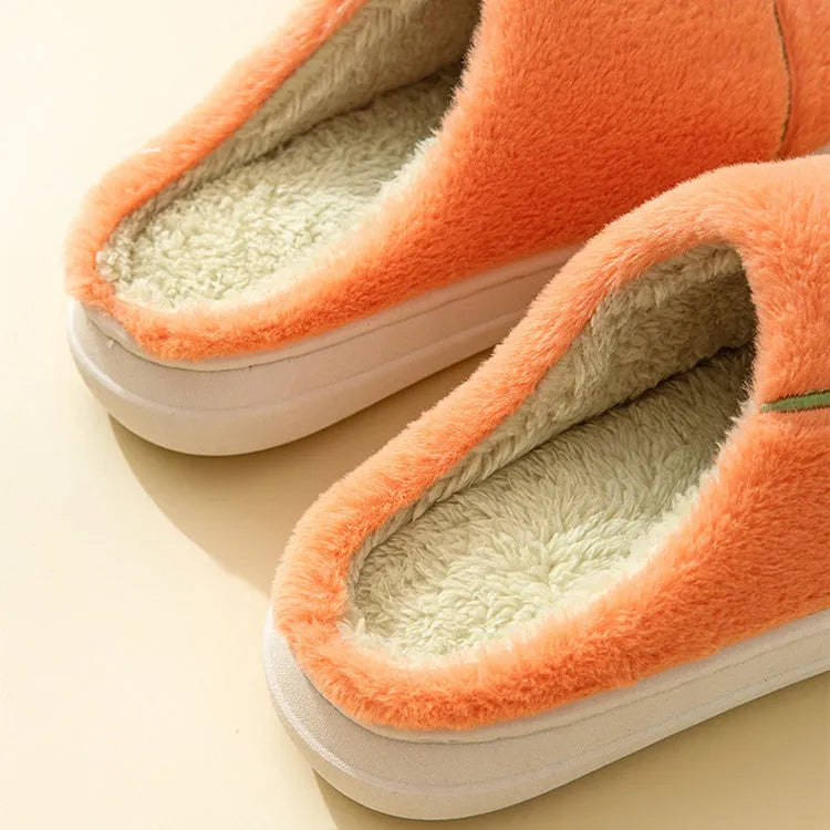 Women's furry indoor slippers in solid colour with plush upper, rubber sole, and wrapped toe, available in multiple colours