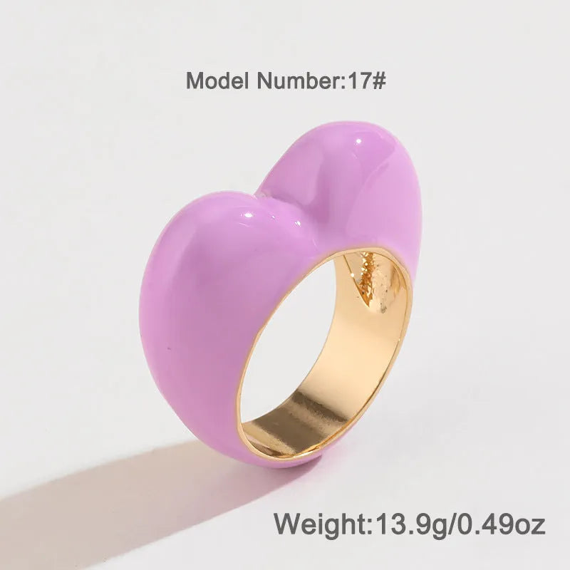 Heart-shaped ring with raised three-dimensional enamel detailing in a choice of colours