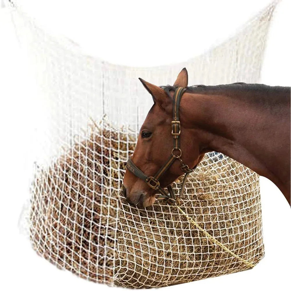 Woven grid horse feeding bag in black hanging, suitable for cattle and sheep.