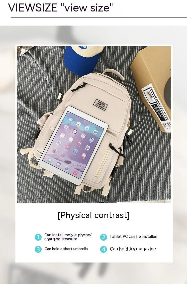 Nylon student backpack in black colour showing laptop compartment and three-dimensional pockets