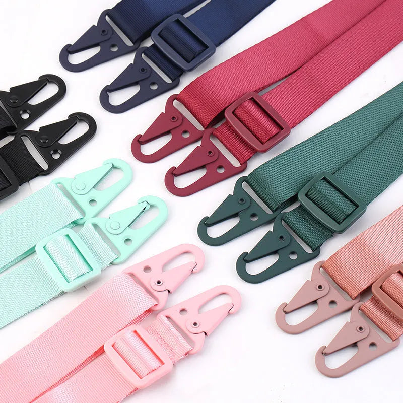 Black TPU buckle ribbon lanyard phone case protective sleeve with lanyard and opening for camera.