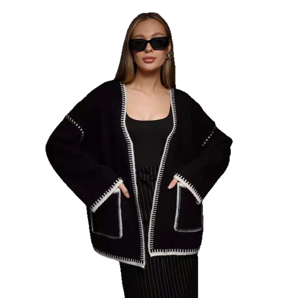 Loose fit knitted cardigan coat in imitation cashmere fabric showing front cardigan styling and long sleeves