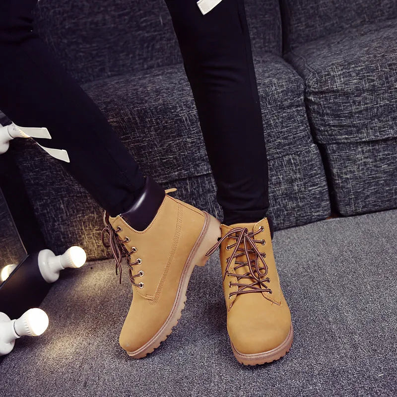 Men's pink high-top Martin boots with velvet lining, flat sole, and round toe.