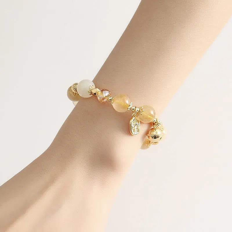 Gold electroplated rutilated quartz bracelet with faceted crystal beads in Lucky Fortune colour