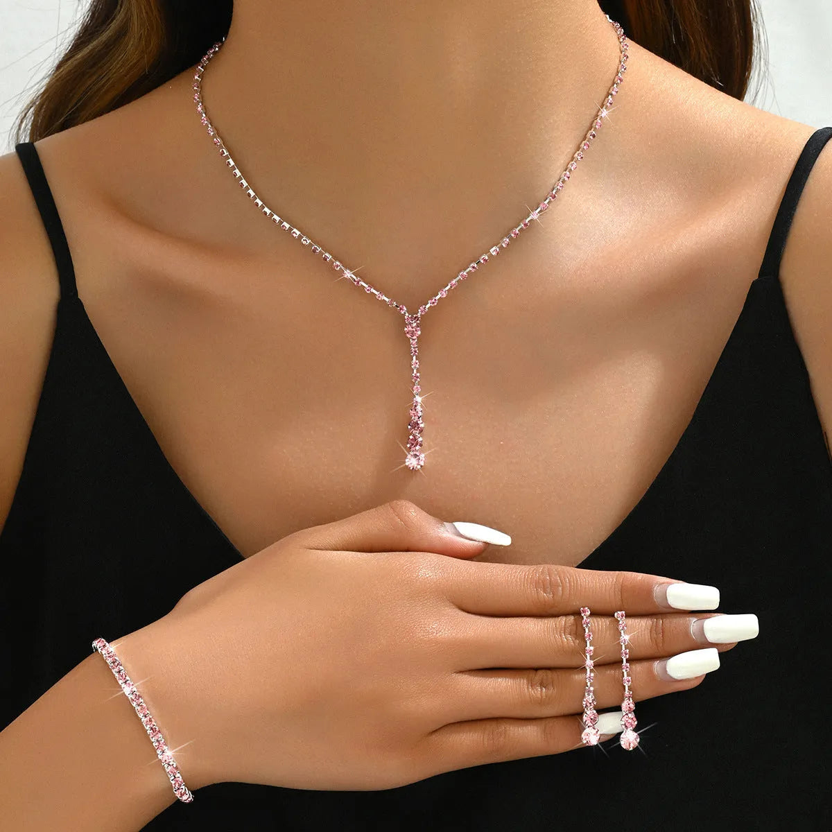 Women's bridal jewellery set with rhinestone heart pendants on snake chain
