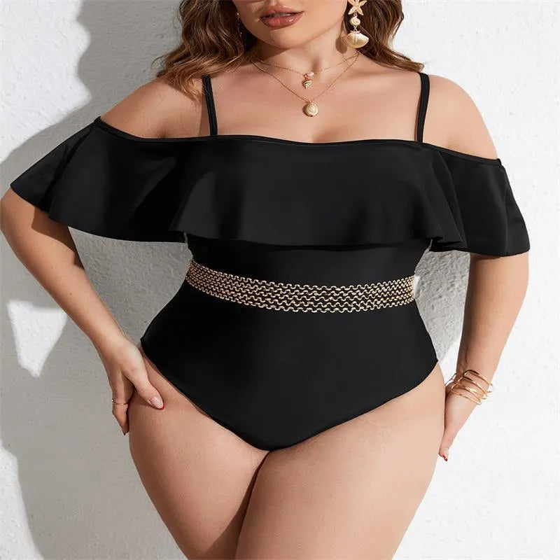 Black solid colour women's one-piece polyester swimsuit on a hanger.