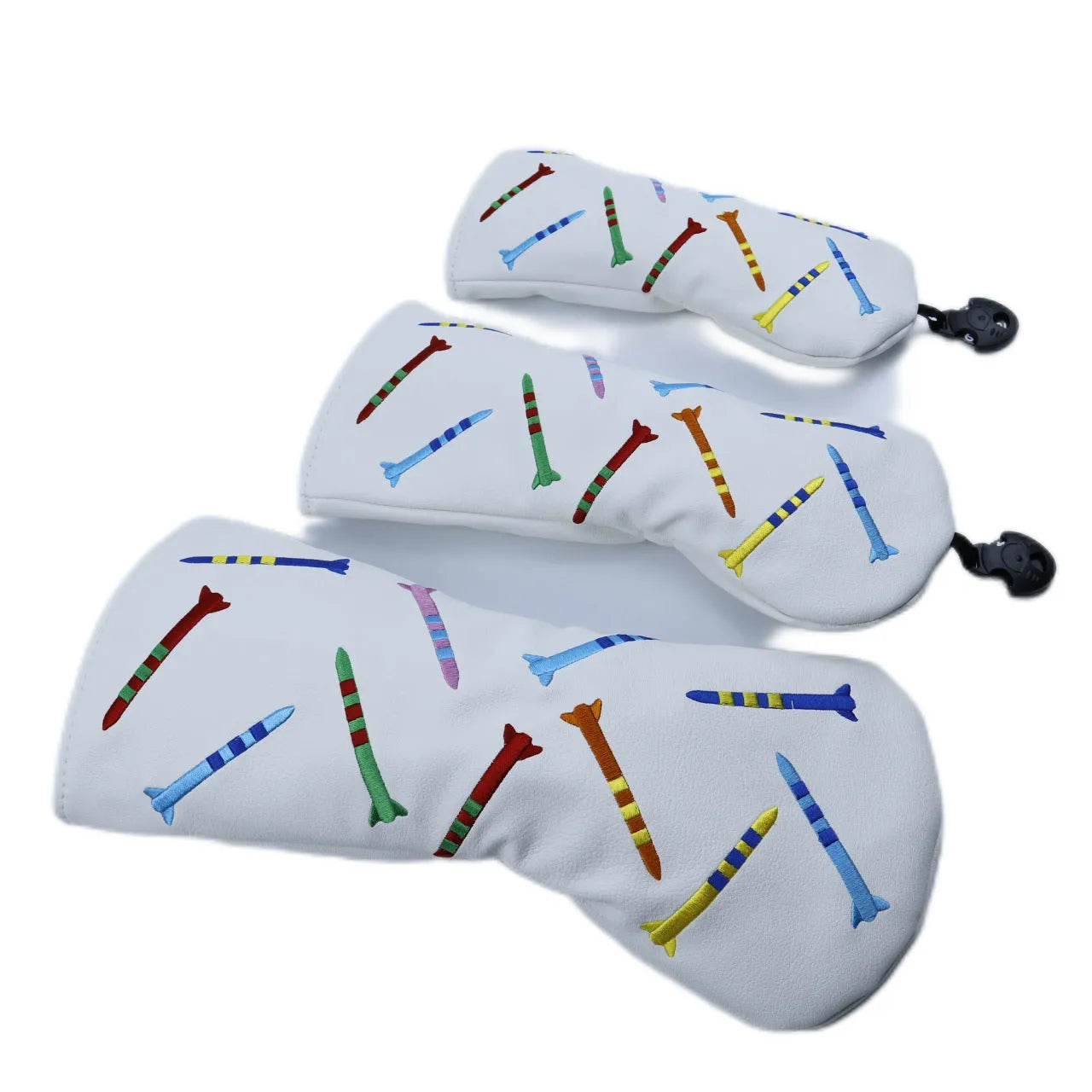 Black and white golf club wooden pole sets in three different sizes on a plain background.