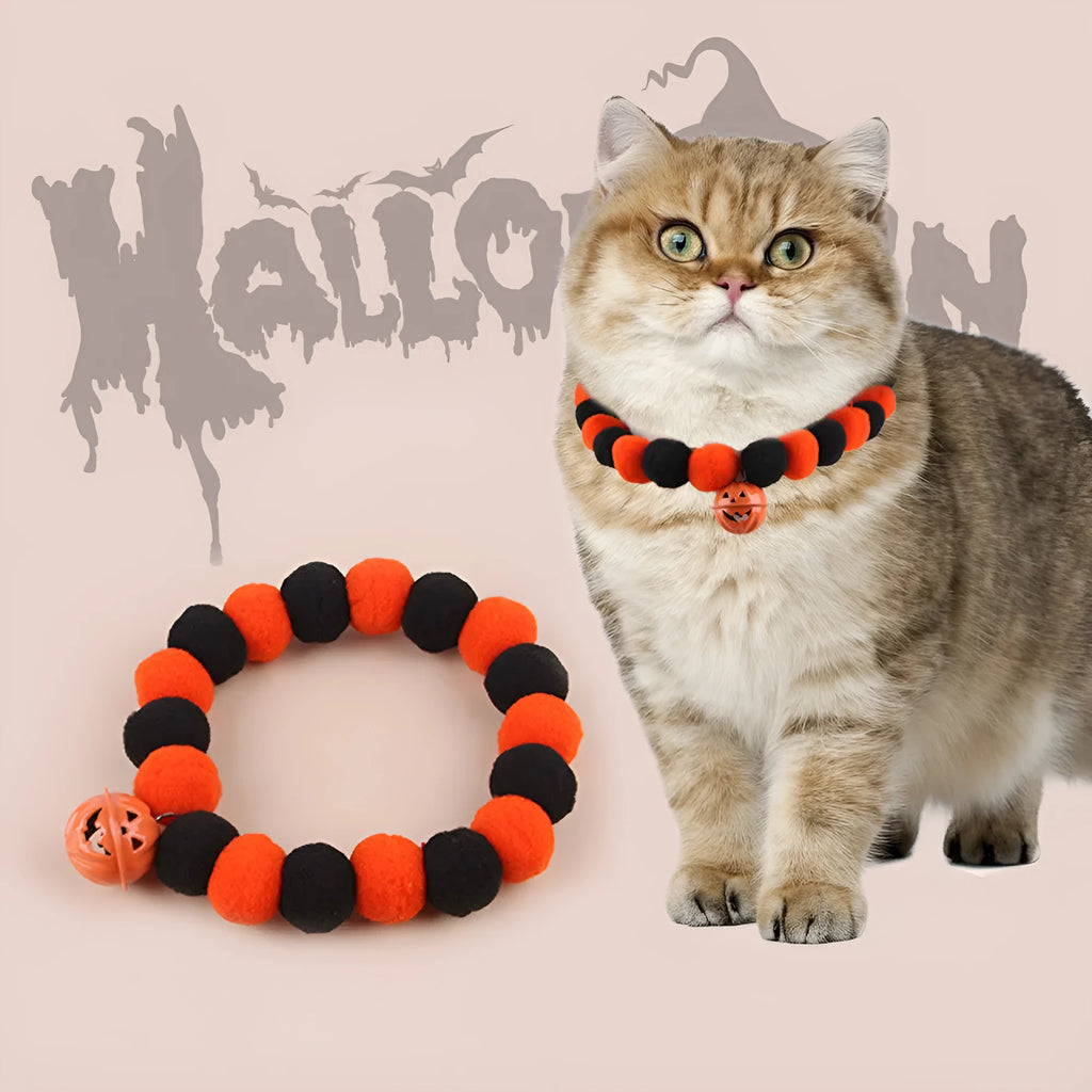 Black Halloween cat collar with pumpkin decoration on adjustable strap
