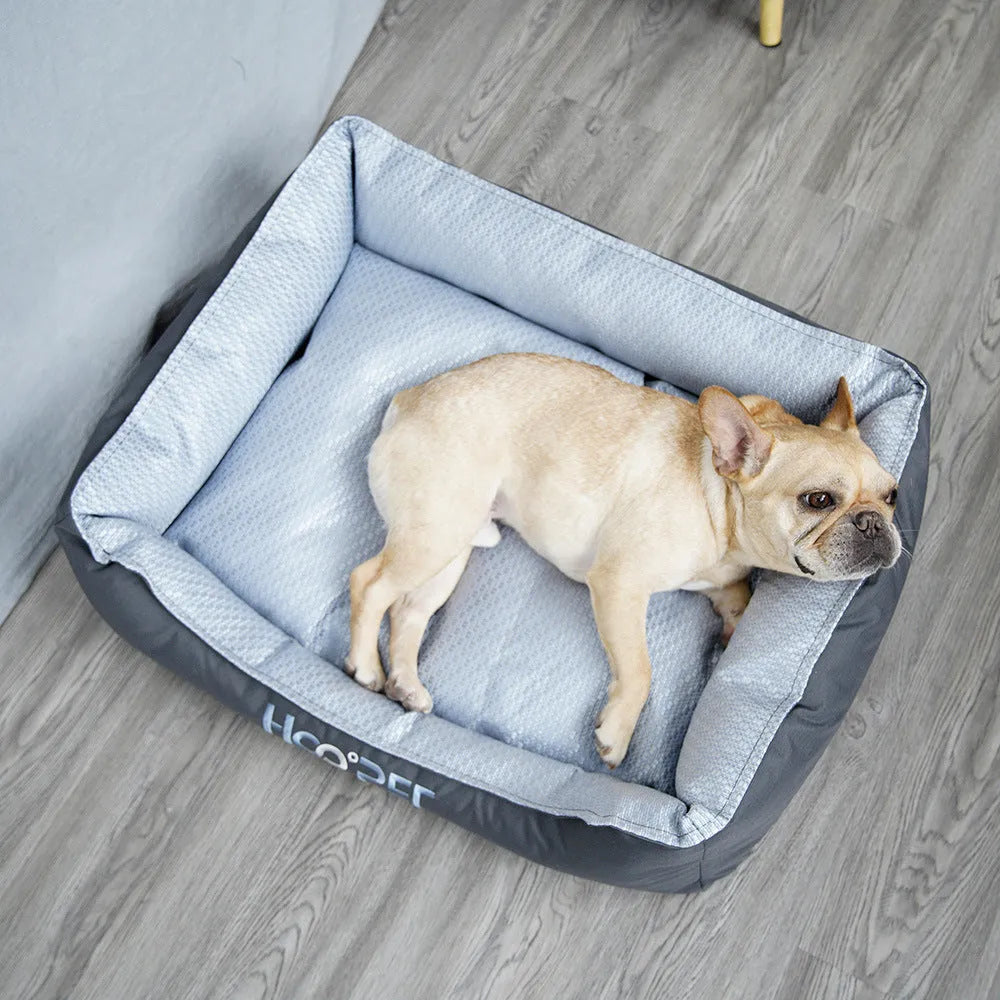 Soft grey pet bed with removable cover in small, medium, and large sizes for dogs and cats