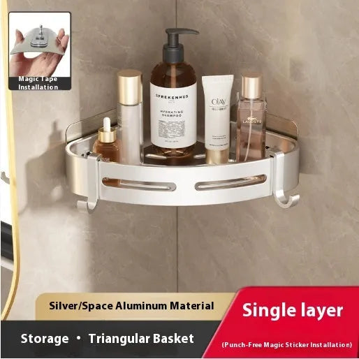 Gun grey metal triangle corner shelf mounted on a bathroom wall for shower storage.