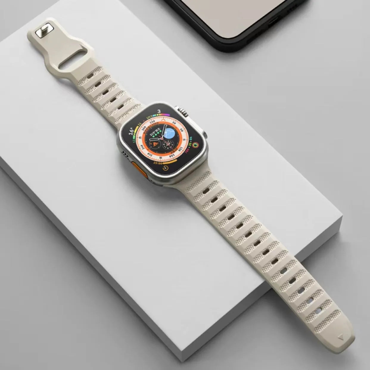 Ultra Fluoro Rubber watch strap for Apple Watch in multiple colours on a grey background.