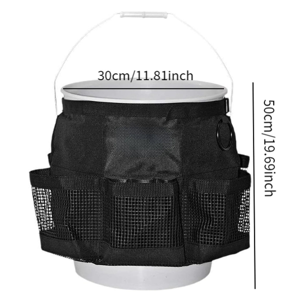 Black cylindrical polyester storage bag hanging on a 5 gallon barrel for organising tools.