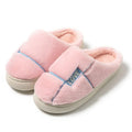 Women's furry indoor slippers in solid colour with plush upper, rubber sole, and wrapped toe, available in multiple colours